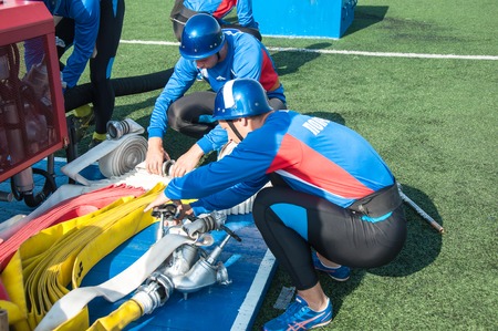 ORENBURG, ORENBURG region, RUSSIA, 8 August, 2014 year. 23 Championship The Ministry of emergency situations of Russia fire-applied sports. Fireman military deployment のeditorial素材