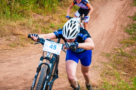 ORENBURG, ORENBURG region, RUSSIA, 10 August, 2014 year. Competition cyclistsのeditorial素材