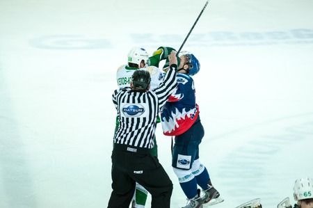 ORENBURG, ORENBURG region, RUSSIA, 26 October, 2014 year. Youth Hockey League championship match "White Tigers" (Orenburg) - "Tolpar" (Ufa). Ice hockey competitionsのeditorial素材