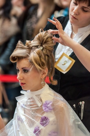 ORENBURG - 6 December: Contest of hairdressers in the nomination wedding hairstyle 6 December 2014 in ORENBURG, ORENBURG region, RUSSIA.のeditorial素材