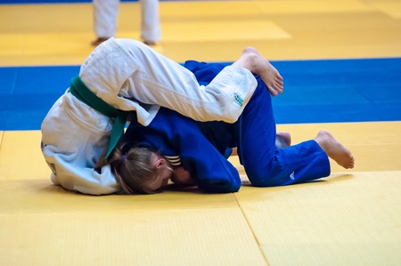 ORENBURG - 29 October: All-Russian Judo tournament in memory of Viktor Chernomyrdin. Girls in Judo competitions 29 October 2014 in ORENBURG, ORENBURG region, RUSSIAのeditorial素材
