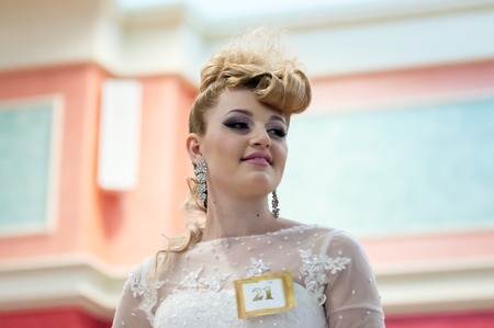 ORENBURG - 6 December: Girl contestant wedding hairstyle 6 December 2014 in ORENBURG, ORENBURG region, RUSSIA.のeditorial素材