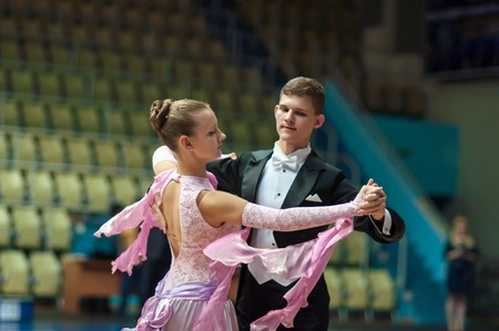 ORENBURG - 03 October: Open Championship city of dancesport. Young couples compete in sports dancing 03 October 2014 in ORENBURG, ORENBURG region, RUSSIA.のeditorial素材