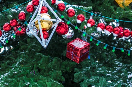 Christmas tree decorated with Christmas gifts and various trinketsの写真素材