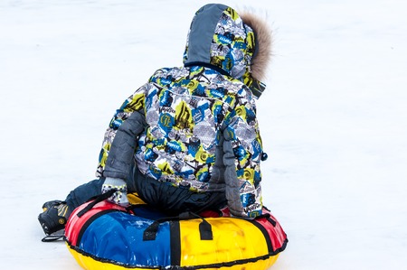 Orenburg, Orenburg region, Russia - 18 January 2015: Baby winter sledding on the Ural Riverのeditorial素材