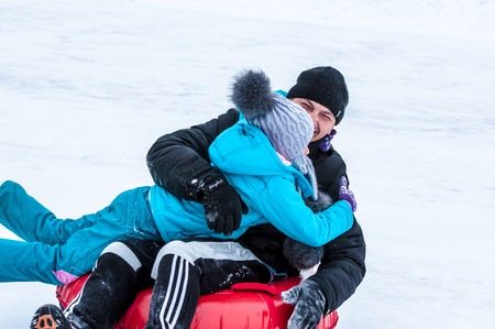 Orenburg, Orenburg region, Russia - 18 January 2015: Baby winter sledding on the Ural Riverのeditorial素材