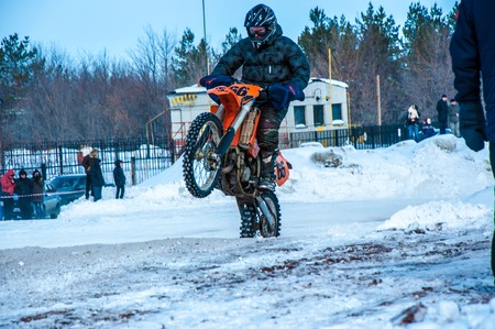 Orenburg, Orenburg region, Russia - 10 March 2013: Juniors compete in winter Motocross.のeditorial素材
