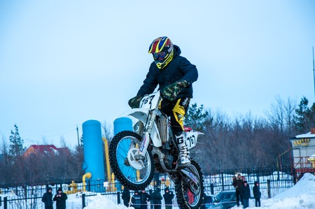 Orenburg, Orenburg region, Russia - 10 March 2013: Juniors compete in winter Motocross.のeditorial素材