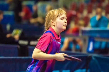 ORENBURG, ORENBURG region, RUSSIA - 5 February 2015: Girl playing table tennis at the tournament strongest sportsmen of Russia "TOP â 12" in table tennis.のeditorial素材