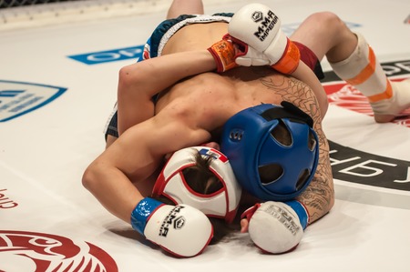 ORENBURG, ORENBURG region, RUSSIA - 21 February 2015: Match two MMA fighters on the open cup of Orenburg region mixed martial martial art (MMA)のeditorial素材