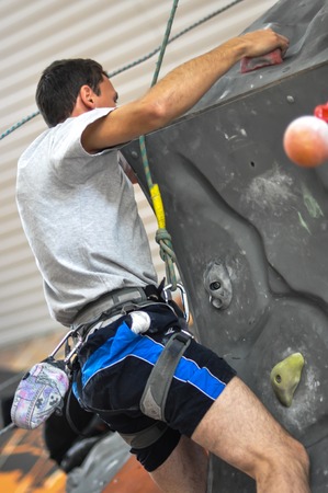 Orenburg, Orenburg region, Russia - 13.10.2012: Young people competing in rock climbingのeditorial素材