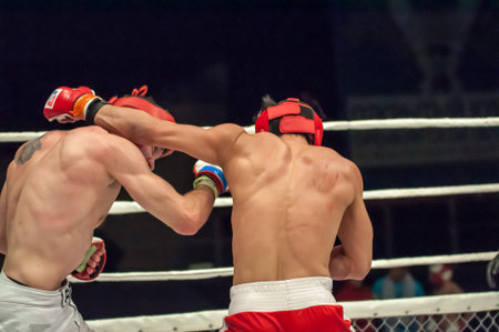 Orenburg, Russia - 21.02.2015: Fight in mixed martial arts fighters on the open cup of Orenburg region mixed martial art (MMA) or "Fights without rules"のeditorial素材