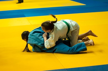 Orenburg, Southern Ural, Russia - 29.10.2014: The Girls compete in the All-Russian Judo tournament in memory of Viktor Chernomyrdinのeditorial素材