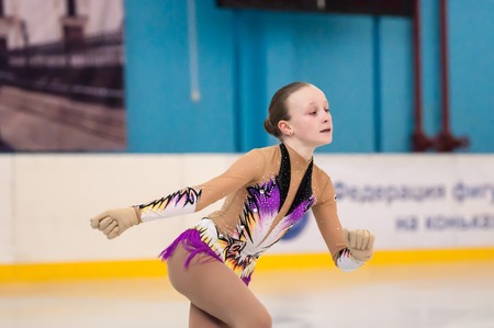 Orenburg, Southern Ural, Russia - 12.04.2015: Figure skating tournament in memory of V. S. Chernomyrdin. Girl figure skater,のeditorial素材