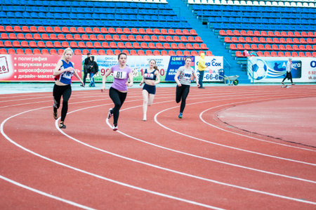 Orenburg, Russia - 24 April 2015: Girls compete in the run on the sports contest students of...