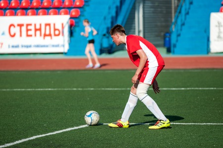Orenburg, Russia - 5 May 2015: Soccer game of College 5 and school 8のeditorial素材