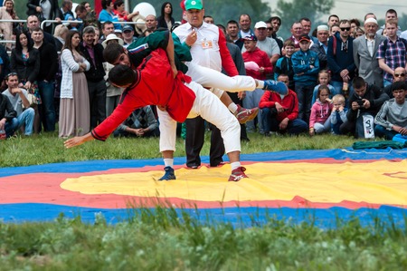 Orenburg, Russia - 7 June 2015: Wrestling at the Sabantuy Festival or Koreshのeditorial素材