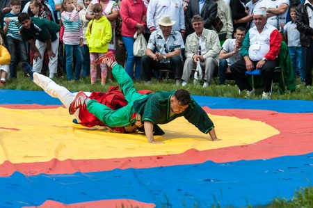 Orenburg, Russia - 7 June 2015: Wrestling at the Sabantuy Festival or Koreshのeditorial素材