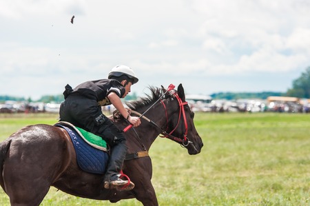 Orenburg, Russia - 7 June 2015: Horse racing on holiday Sabantuyのeditorial素材
