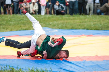 Orenburg, Russia - 7 June 2015: Wrestling at the Sabantuy Festival or Koreshのeditorial素材