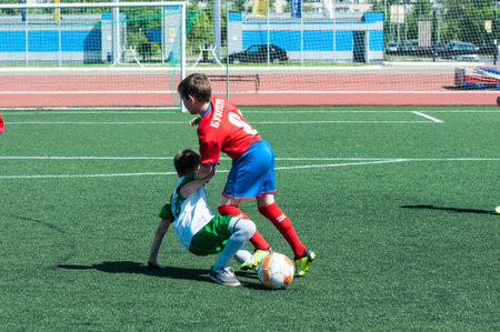 Orenburg, Russia - 22 May 2015: The boys play football at the competition Lokobol-2015.