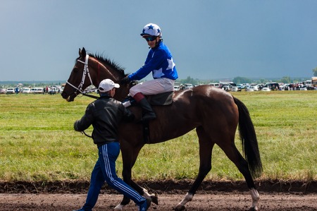 Orenburg, Russia - 7 June 2015: Racing on horsebackのeditorial素材
