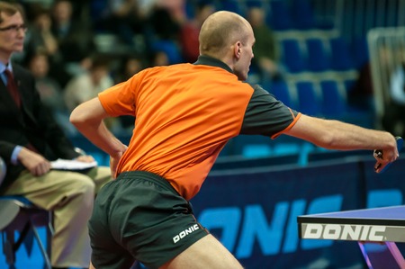 Orenburg, Russia - 03.04.2015: Game tennis A.SMIRNOV "Fakel Gazproma Orenburg" and D.Habesohn "Weinviertel Lower Austria" in Semifinal League European champions in table tennis.のeditorial素材