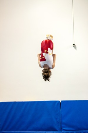 Orenburg, Russia - 19 April 2016: Girls compete in jumping on the trampoline on Championship privolzhskiy districtのeditorial素材