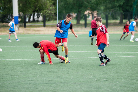 Orenburg, Russia - 9 July 2016: The boys play football at the city tournament on mini-football among childrens amateur teams memory trainer Kolosovaのeditorial素材
