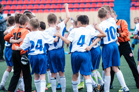 Orenburg, Russia - 1 June 2016: The boys play football in the preliminary games football festival "Lokobol-2016".のeditorial素材