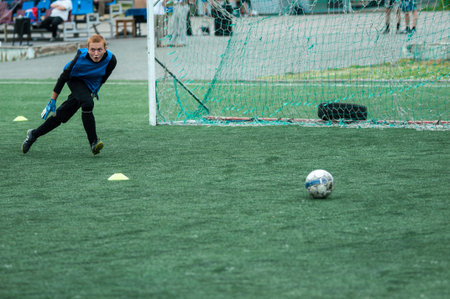Orenburg, Russia - 9 July 2016: The boys play football at the city tournament on mini-football among...