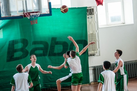 Orenburg, Russia - 15 May 2015: Boys play basketball for the Cup High School Basketball Leagueのeditorial素材