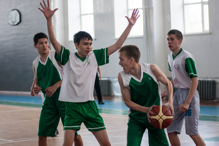 Orenburg, Russia - 15 May 2015: Boys play basketball for the Cup High School Basketball Leagueのeditorial素材