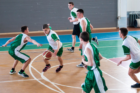 Orenburg, Russia - 15 May 2015: Boys play basketball for the Cup High School Basketball Leagueのeditorial素材