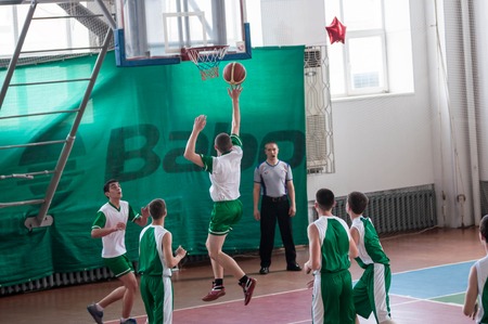 Orenburg, Russia - 15 May 2015: Boys play basketball for the Cup High School Basketball Leagueのeditorial素材