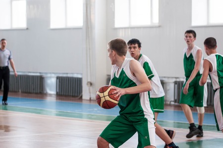 Orenburg, Russia - 15 May 2015: Boys play basketball for the Cup High School Basketball Leagueのeditorial素材