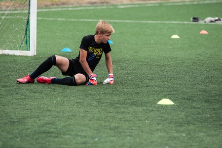 Orenburg, Russia - 9 July 2016: The boys play football at the city tournament on mini-football among childrens amateur teams memory trainer Kolosovaのeditorial素材
