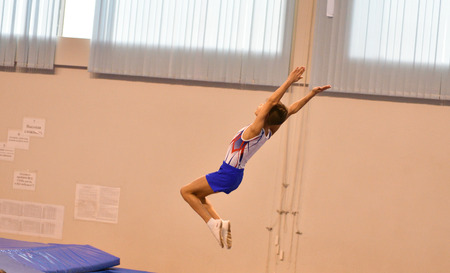 Orenburg, Russia - January 28, 2017: The boys compete in jumping on the trampoline on competitions at the Orenburg region among Juniorsのeditorial素材