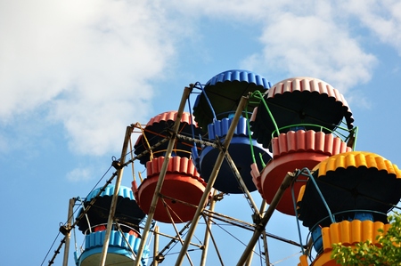 Ferris wheel in a summer amusement parkの写真素材