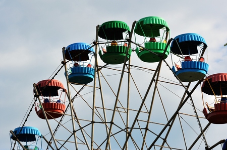 Ferris wheel in a summer amusement parkの写真素材