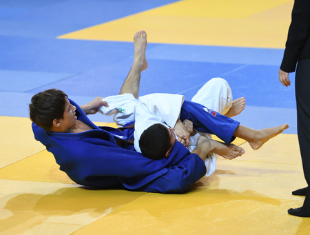 Orenburg, Russia - 21 October 2016: Boys compete in Judo at the all-Russian Judo tournament among boys and girls born between 2000-2002, dedicated to the memory of V. S. Chernomyrdinのeditorial素材