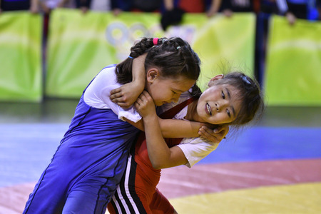 Orenburg, Russia-May 5, 2017 year: Girls compete in freestyle wrestling at the all-Russian tournament on free-style wrestling "Carpet of hope"のeditorial素材