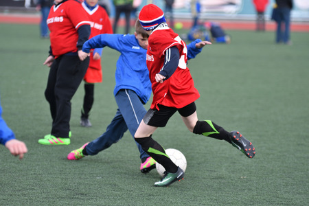 Orenburg, Russia-April 26, 2017 year: the boys play football on Cup Mayor Orenburg Futsal Championship among teams of boys born in 2006-2007のeditorial素材