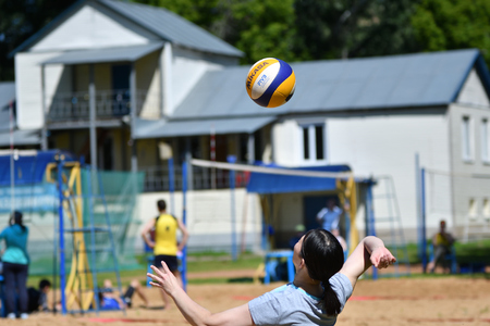 Orenburg, Russia, 9-10 June 2017 year: Girl playing beach volleyball on City tournament Beach Volleyball «Golden Sands»のeditorial素材