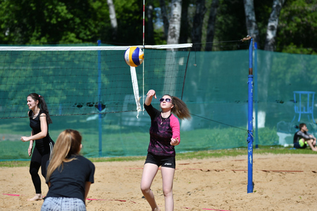 Orenburg, Russia, 9-10 June 2017 year: Girl playing beach volleyball on City tournament Beach Volleyball Golden Sandsのeditorial素材