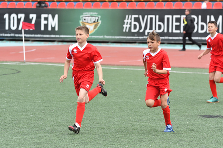 Orenburg, Russia - May 28, 2017 year: The boys play football in the preliminary games football festival "Lokobol-2017"のeditorial素材