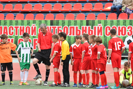 Orenburg, Russia - May 28, 2017 year: The boys play football in the preliminary games football festival "Lokobol-2017"のeditorial素材