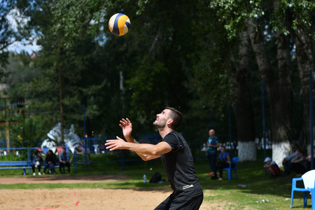 Orenburg, Russia, 9-10 June 2017 year: Boys playing beach volleyball on City tournament Beach Volleyball «Golden Sands»のeditorial素材