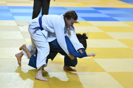 Orenburg, Russia - 21 October 2016: Girls compete in Judo at the all-Russian Judo tournament among boys and girls born between 2000-2002, dedicated to the memory of V. S. Chernomyrdinのeditorial素材