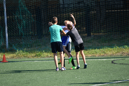 Orenburg, Russia - August 18, 2017 year: the boys play football on City tournament on mini-football "Sports yard-2017"のeditorial素材